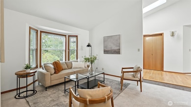 This inviting flex space offering large bay windows & a skylight is perfect for a formal sitting space, reading nook or home office!