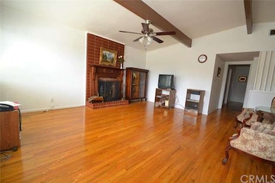 Living room area features hardwood floors & wood/g