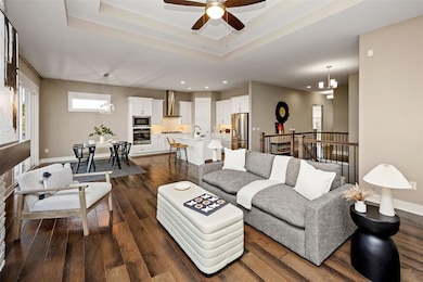 HIckory hardwood floors thru main living area, kitchen & dining