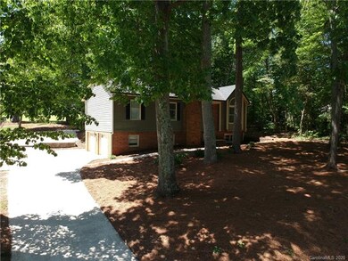 Driveway and 2 car garage.