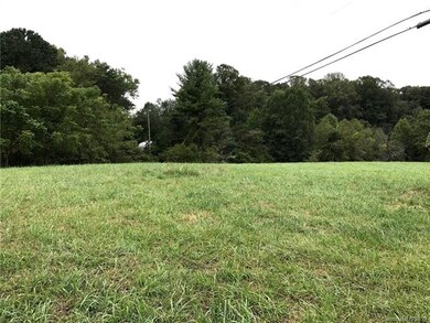 Property goes straight across field to woods below