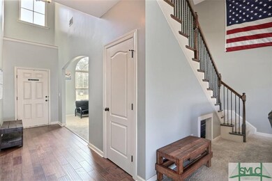 Take a closer look by the staircase...Fido has his