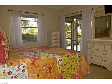 Master bedroom with view of the water opening onto