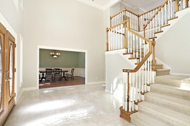 looking across the foyer you see the formal dining room