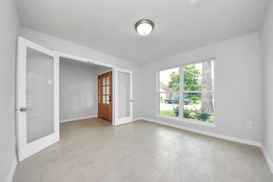 Unstaged view of the office/ fourth room.