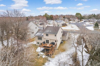 Enjoy the spacious yard complete with the large Trex deck that walks down to a firepit, storage shed,and walking trail that goes around the wetlands.