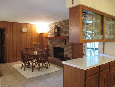 Dinette with fireplace. Check out the china cabine
