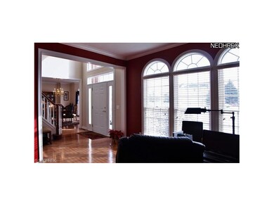 Custom crown moldings, windows and finishes make t
