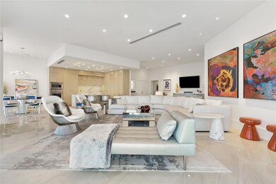 Open concept living dining kitchen floorplan with