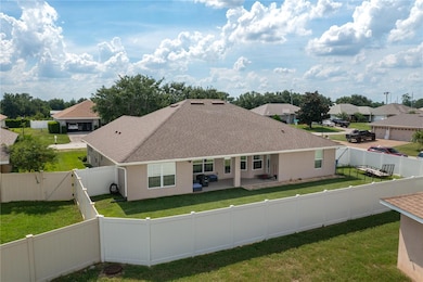 View of Rear Fence, Yard, and Home