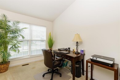 Home office with large picture window.
