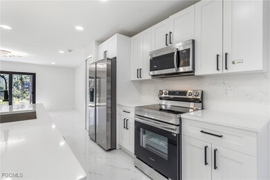 1103 Williams Ave, Lehigh Acres, FL 33972 - photo 5