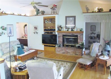 Living room with cathedral ceilings, propane firep