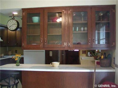 Kitchen. Kitchen features built in glass cabinets 