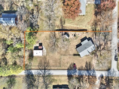 Home faces SE corner of the full acre lot, and has