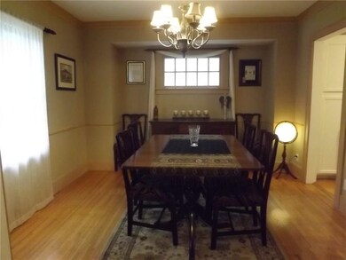 Large formal dining room with hardwoods and bump o