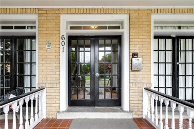 Entrance to property featuring french doors