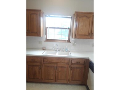 KITCHEN OVERLOOKING BACK YARD