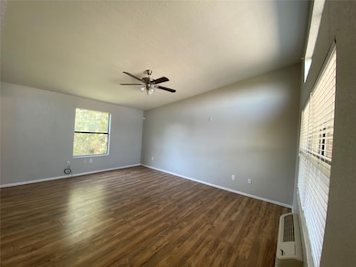 This super spacious living room is ready for furni
