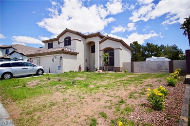 Mediterranean / spanish-style home featuring a til