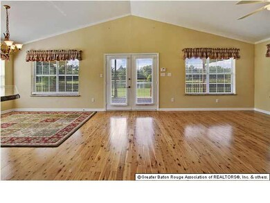 Den with beautiful Australian Cypress flooring