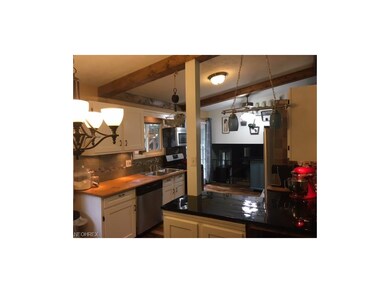 Wall was removed to open kitchen up to dining room