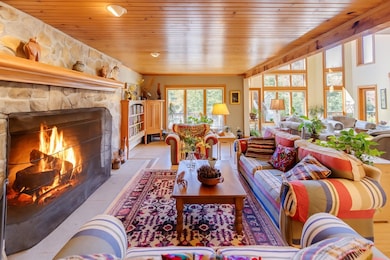 Huge stone fireplace will give you massive crackling fires