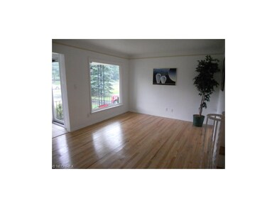 Spacious Living Room with Gleaming Hardwood Floors