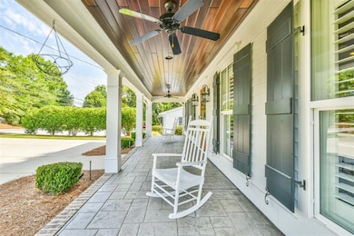 View of patio featuring covered porch and ceiling 