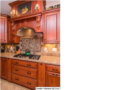 2nd view of kitchen with beautiful backsplash and 