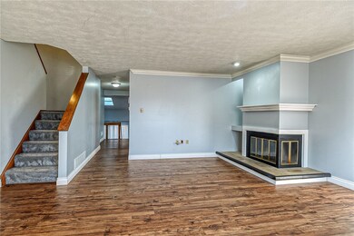 View from front window into hall way to kitchen/dr