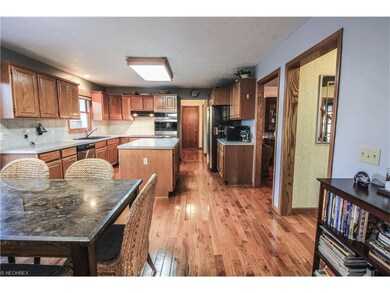 The beautiful Hardwood Floors flow seamlessly thro