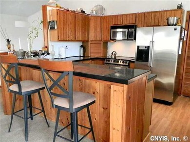 Kitchen. There is plenty of cabinetry in this attr