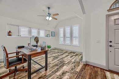 Plantation shutters and beautiful wood floors set this home apart!