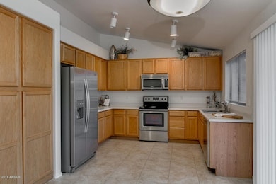 Kitchen Overlooks Large Backyard