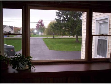 Exterior Front View of front Lawn, notice Blacktop