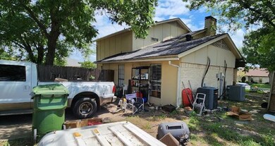 View of side of property featuring cooling unit