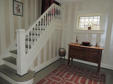 Foyer. Its a 10 from this foyer on. Nicely appoint
