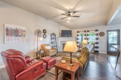 Large open concept with gas fireplace and vaulted