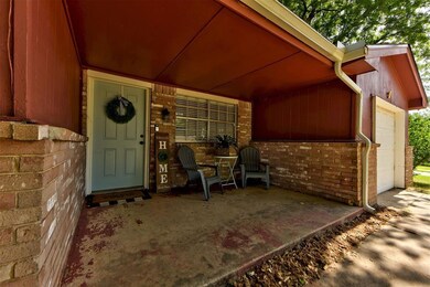 Property entrance with a garage