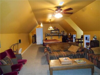 Upstairs room of the detached garage showing possi