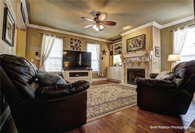 Built-ins on left side of fireplace in Living Room