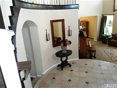Grand Entry Foyer with Sweeping Staircase