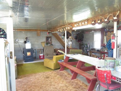 MAIN ROOM WITH WOOD BURNER