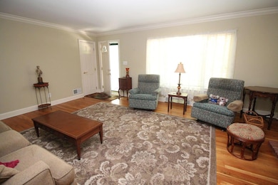 Living room with coat closet