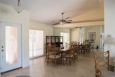 dining room with vaulted ceiling