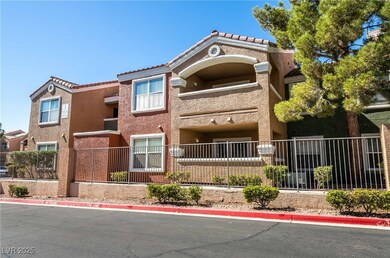 View of front of property featuring fence, stucco