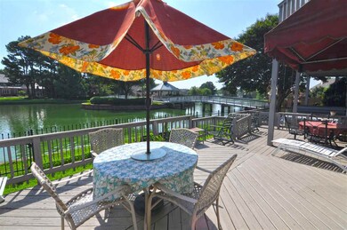 Sit under the covered patio and grill out with fam
