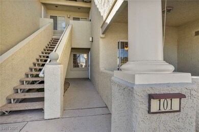 Property entrance with stucco siding