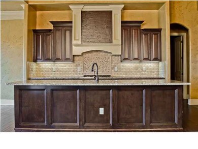 Large granite topped island in the kitchen will ma